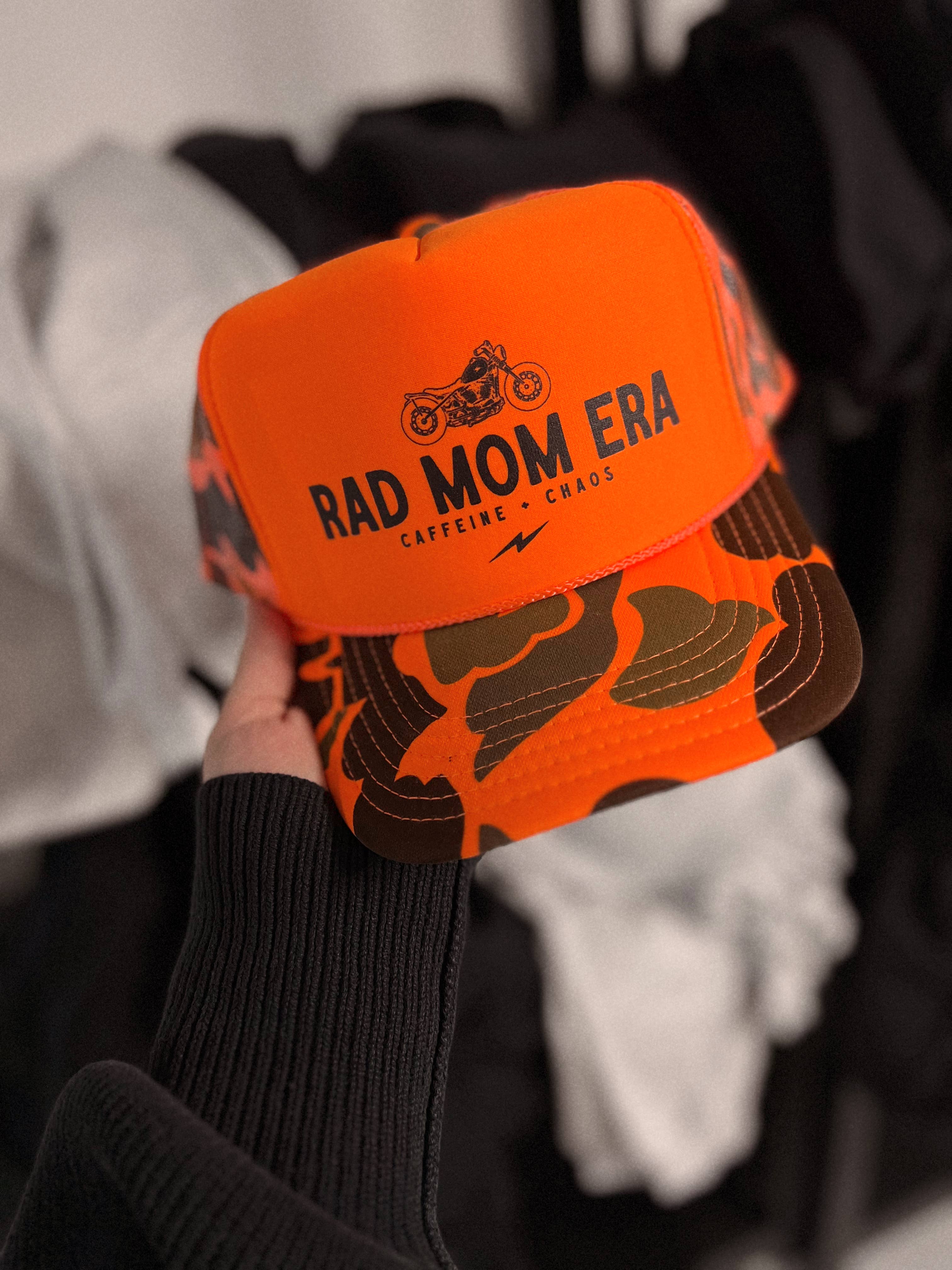WE THE BABES - Rad Mom Era Trendy Trucker Hat - Neon Orange Camo