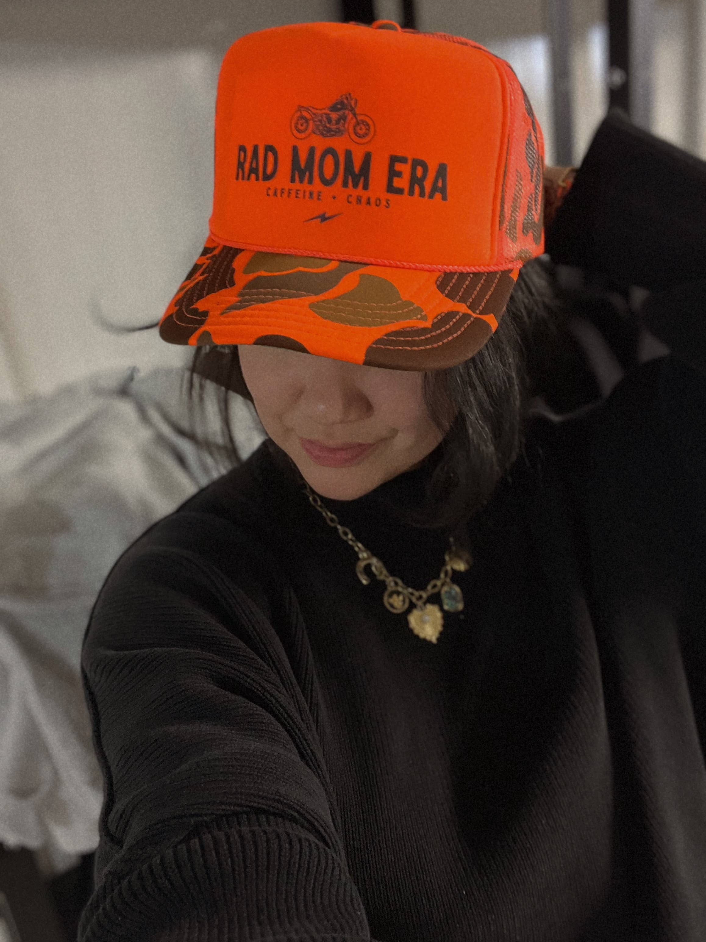 WE THE BABES - Rad Mom Era Trendy Trucker Hat - Neon Orange Camo